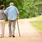 Caregiver – woman helping senior man with shopping